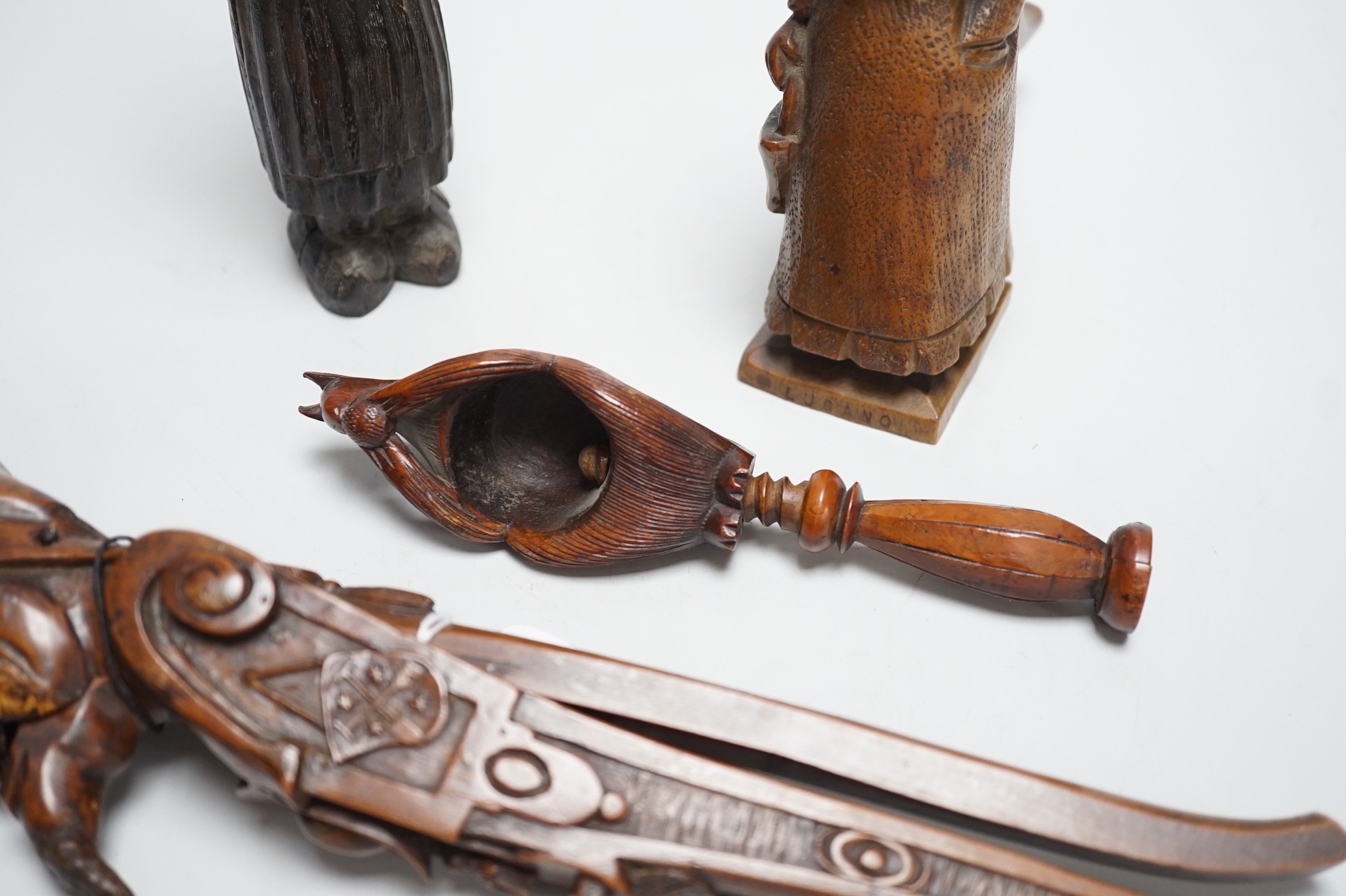 Four late 19th /early 20th century carved wood nutcrackers